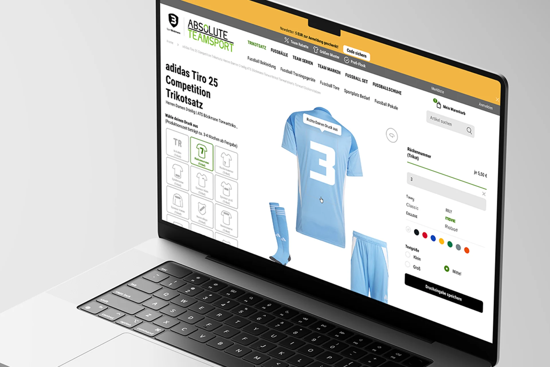 Laptop mit geöffneter Sport Böckmann-Website und Darstellung von Trikot-Druckmöglichkeiten