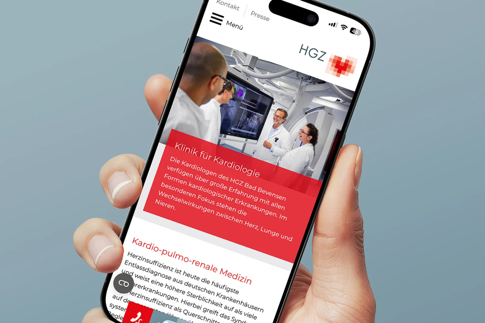 Handy mit mobiler Website des HGZ